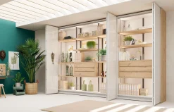 Armario a medida de puertas plegables con frente en cristal lacado de Lagrama