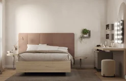 Dormitorio con cabecero tapizado con capitoné Button de Lagrama