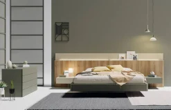 Dormitorio con cabezal de madera y luz led Paralex de Lagrama