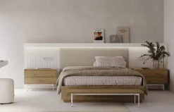 Dormitorio con cabezal tapizado de Lagrama